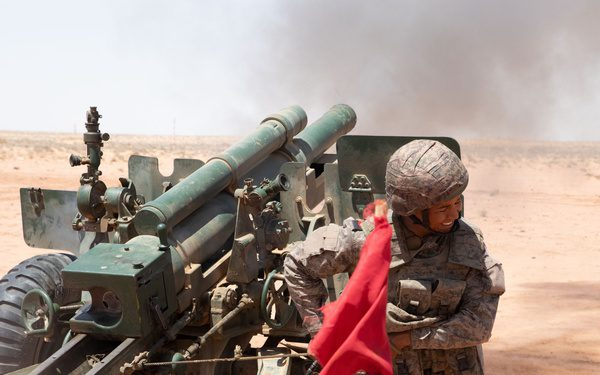 Tunisia military artillerymen carry out a fire mission during exercise Flintlock 2024 military training at their primary training area at Ben Ghilouf. (U.S Military DVID)