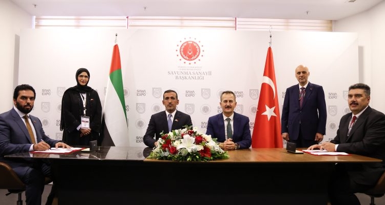 Dr. Khalifa ALBLOOSHI, CEO of Calidus Holding Group and Dr. Mehmet Akif NACAR, CEO of HAVELSAN, signing the Agreement at SAHA Expo 2024 at Istanbul, in the presence of Mr. Haluk GÖRGÜN of Secretary of Turkish Defence Industries and H.E. Mohamed bin Fadhil Al Mazrouei, UAE Minister of State for Defense Affairs.