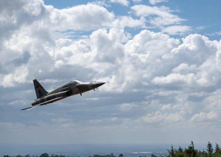 A Kenya Air Force pilot conducts a capabilities fly-by in an F-5E during Justified Accord 2024 (JA24) at the Counter Insurgency Terrorism and Stability Operations Training Centre, Nanyuki, Kenya, March 5, 2024.