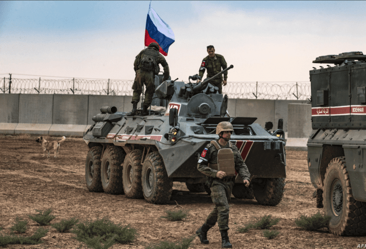 Russian troops with military vehicles are seen on patrol outside the town of Darbasiyah in Syria's northeastern Hasakeh province, on the border with Turkey, Novemer 1, 2019. Photo: AFP